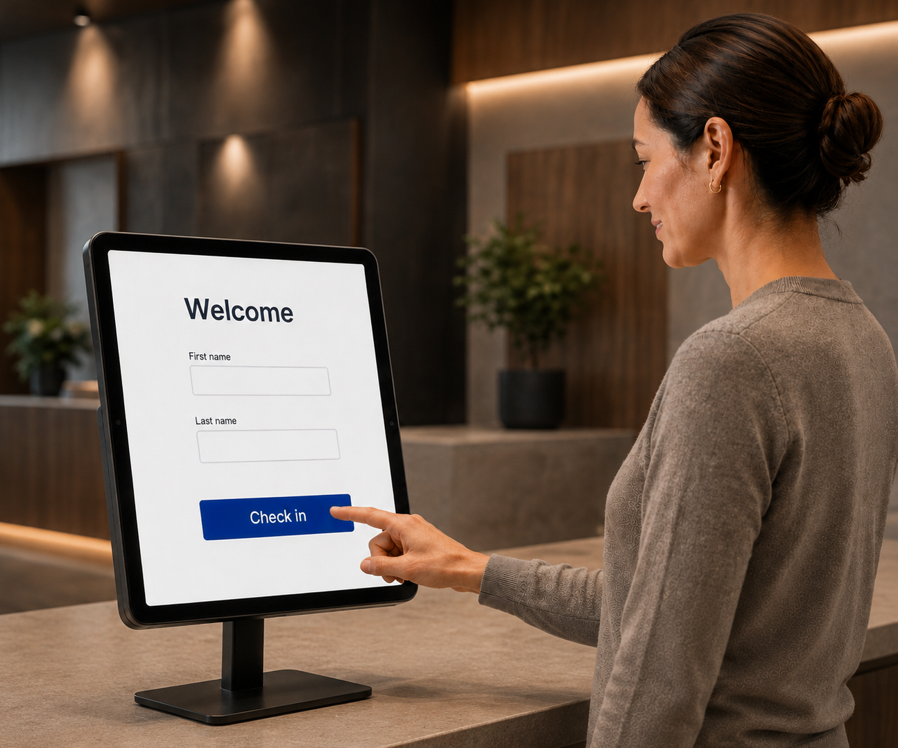 Woman using a self-service check-in tablet